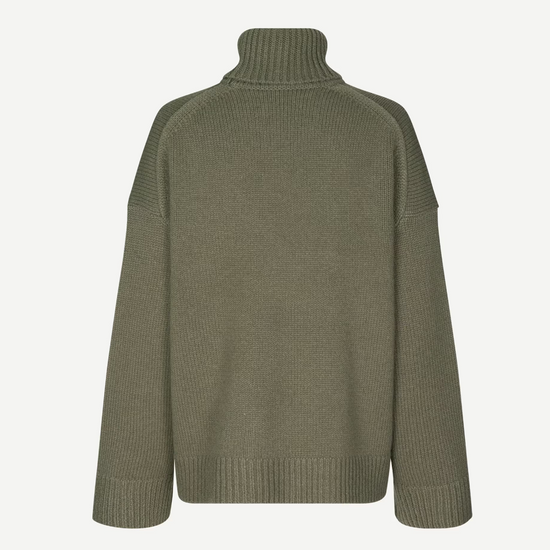 dark green turtle neck ribbed jumper with dropped shoulders rear view