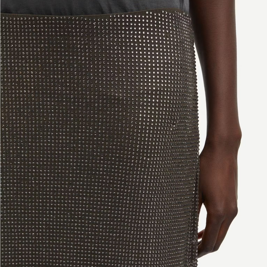 dark grey long skirt covered in rhinestones  close up