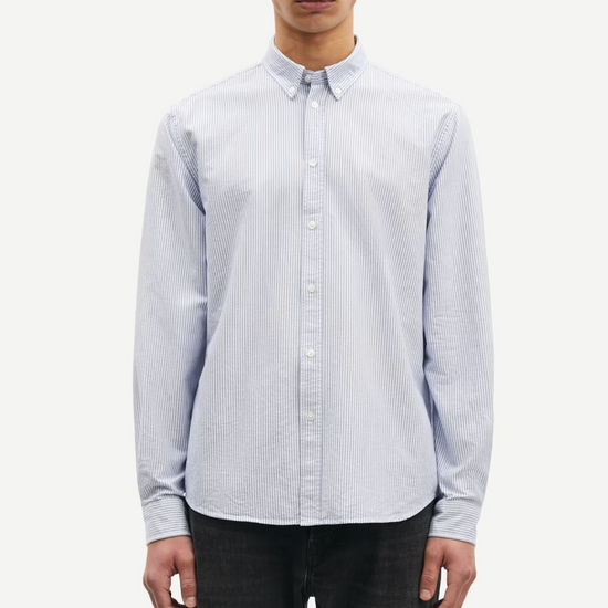 narrow blue stripe shirt with single button cuff and pleat in rear yoke  model shot