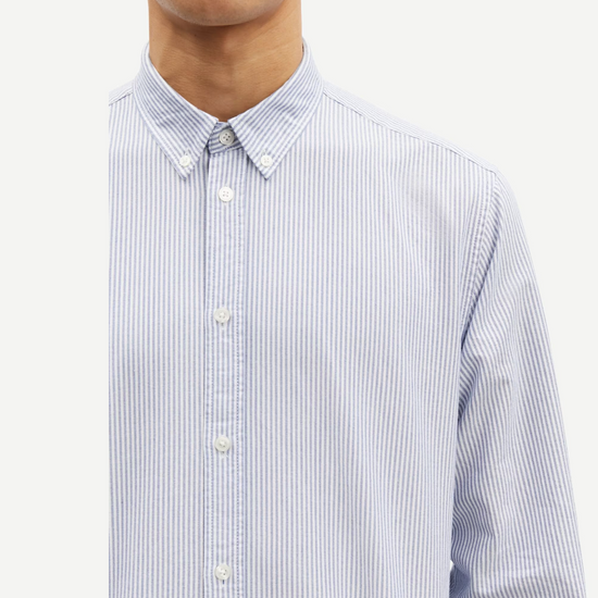 narrow blue stripe shirt with single button cuff and pleat in rear yoke  close up