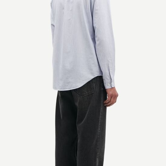 narrow blue stripe shirt with single button cuff and pleat in rear yoke  rear view