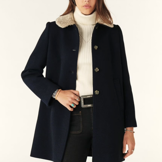 navy 3/4 length coat with faux fur collar, raglan pockets and marbled buttons model shot