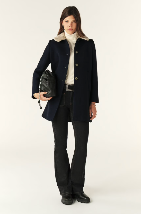 navy 3/4 length coat with faux fur collar, raglan pockets and marbled buttons  model shot