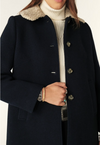 navy 3/4 length coat with faux fur collar, raglan pockets and marbled buttons close up