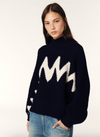 Model shot of jumper worn with denim