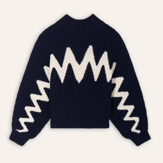 Reversible navy and white jumper with zig zag design.