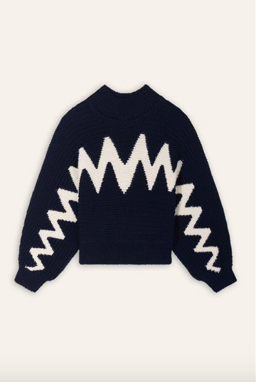 Reversible navy and white jumper with zig zag design.