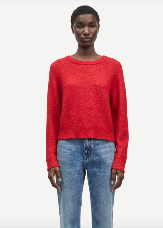 red round neck short jumper with ribbed neck, cuff and hem model shot