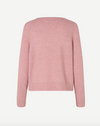 baby pink round neck knit with ribbed neck, cuffs and hem rear view