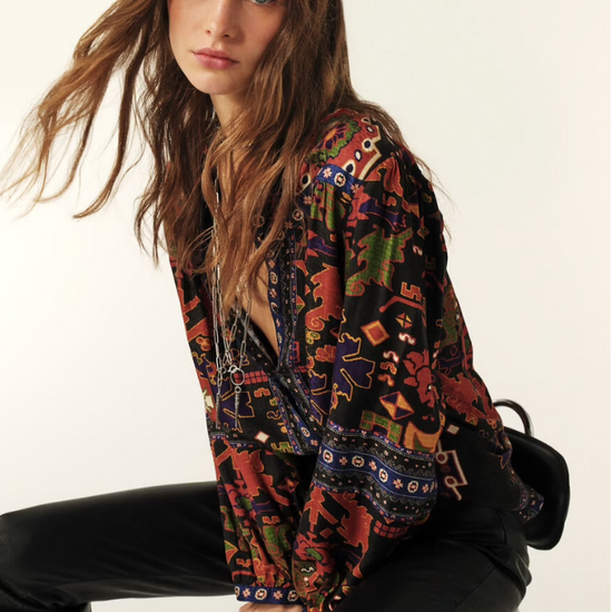 long sleeved shirt with multi coloured print and v neck side view 