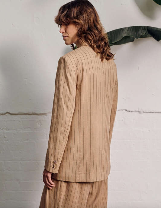 Rear view of caramel and brown pinstripe blazer