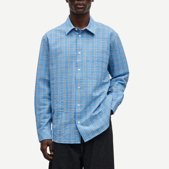 long sleeve shirt with blue check print and cheese cloth like fabric model shot
