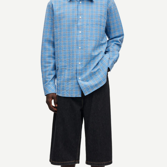 long sleeve shirt with blue check print and cheese cloth like fabric model shot