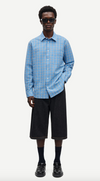 long sleeve shirt with blue check print and cheese cloth like fabric model shot