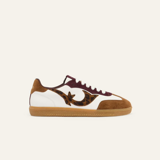 white leather trainers with brown suede to, back and animal print design on the side 