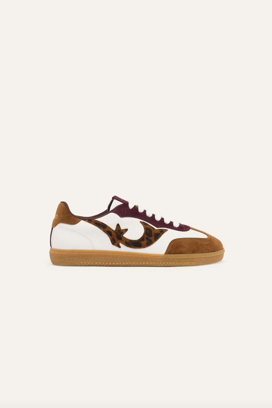 white leather trainers with brown suede to, back and animal print design on the side 
