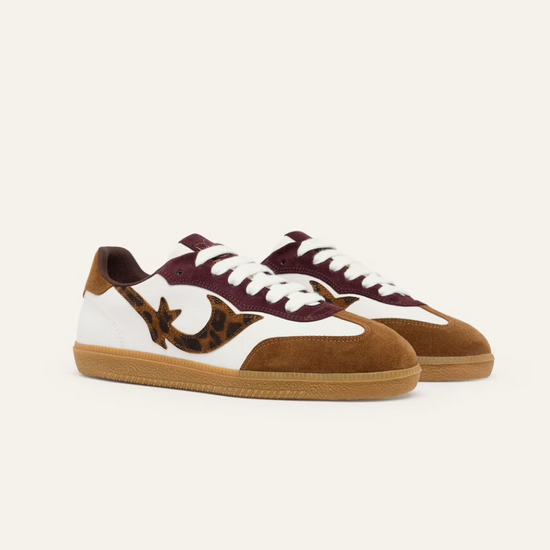 white leather trainers with brown suede to, back and animal print design on the side