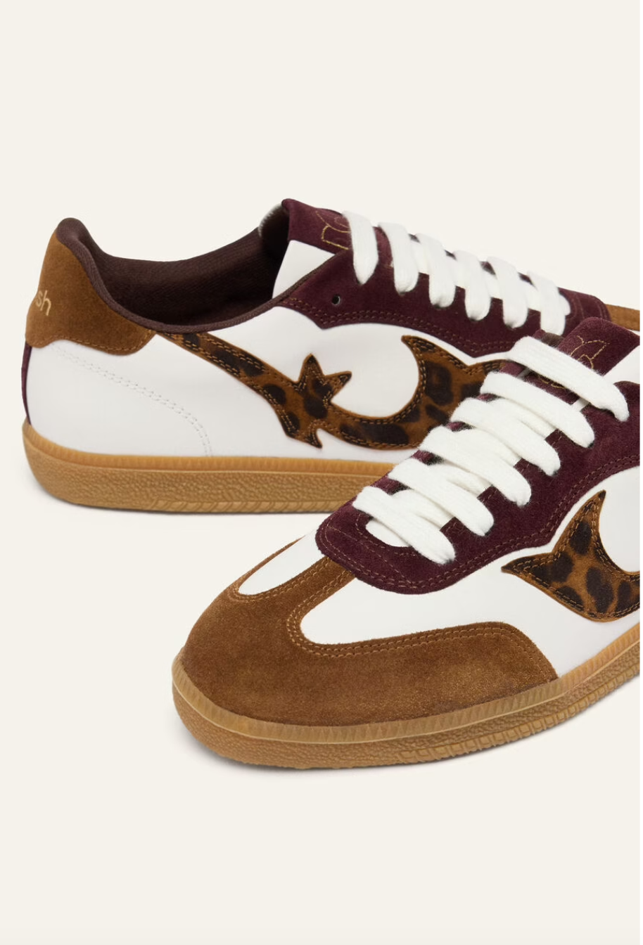 white leather trainers with brown suede to, back and animal print design on the side 