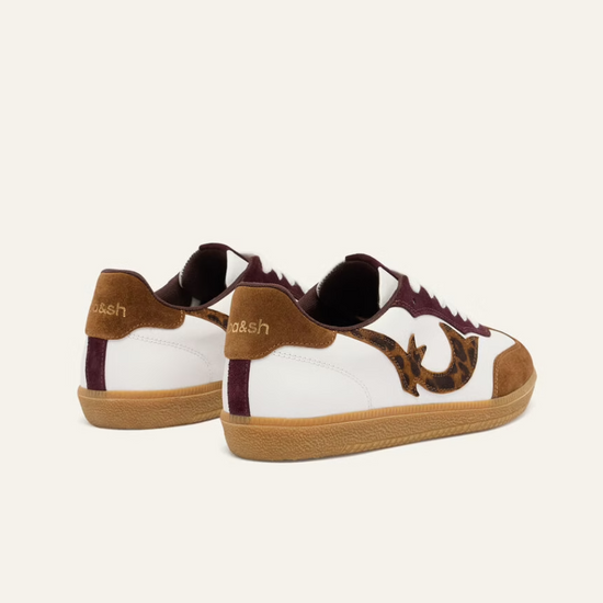 white leather trainers with brown suede to, back and animal print design on the side  rear view