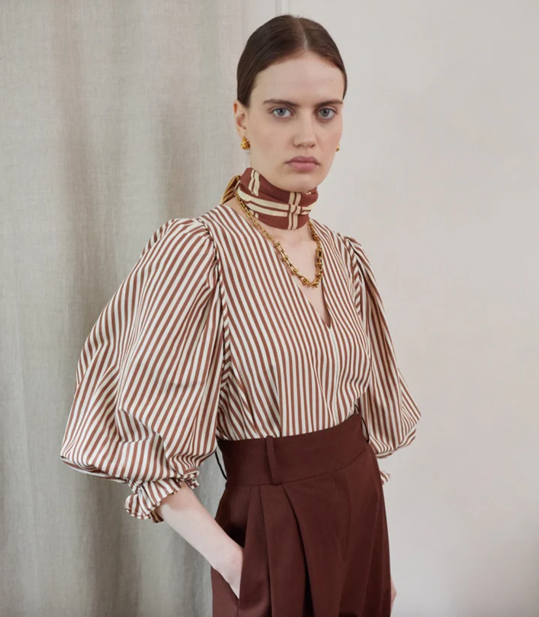 v neck cotton brown stripe top with long blouson sleeves model shot