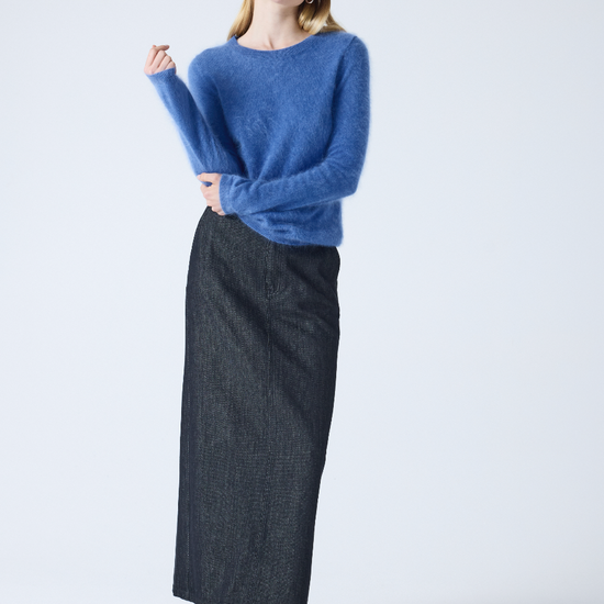denim blue crew neck cashmere jumper with long sleeves and hairy textured feeling model shot