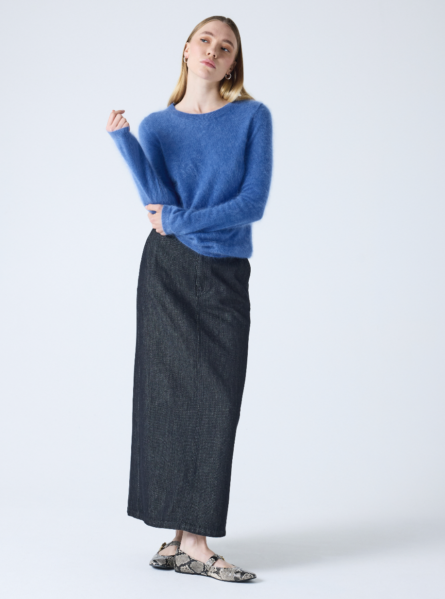 denim blue crew neck cashmere jumper with long sleeves and hairy textured feeling model shot