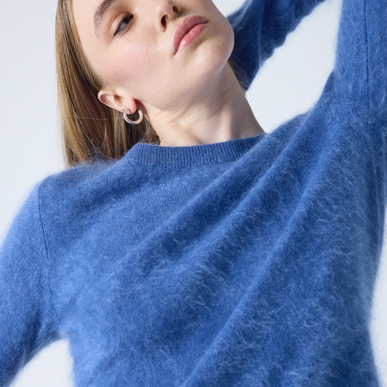 denim blue crew neck cashmere jumper with long sleeves and hairy textured feeling 