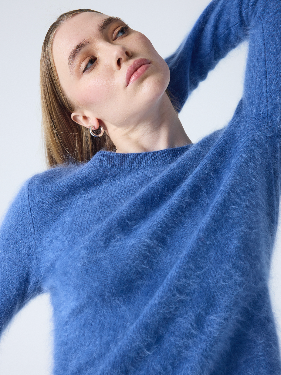 denim blue crew neck cashmere jumper with long sleeves and hairy textured feeling 