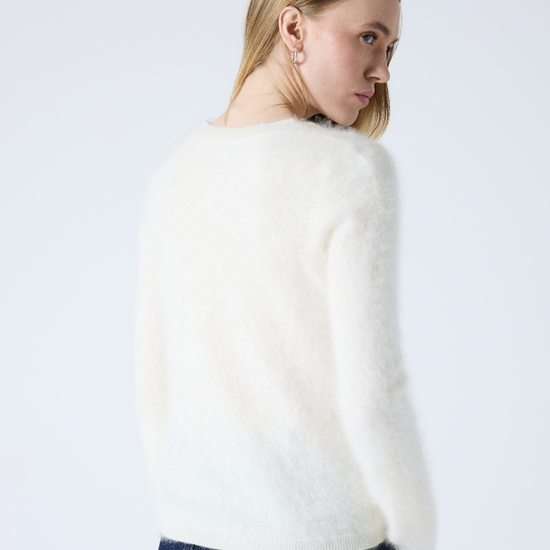 cream crew neck jumper with long sleeves and fluffy texture rear view