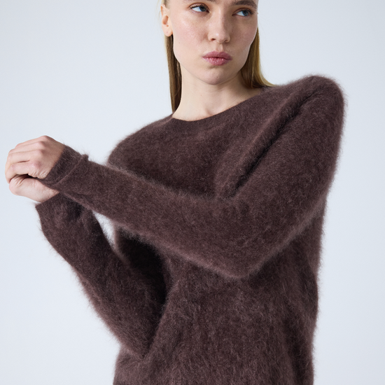 brown crew neck jumper with long sleeves and fluffy texture model shot