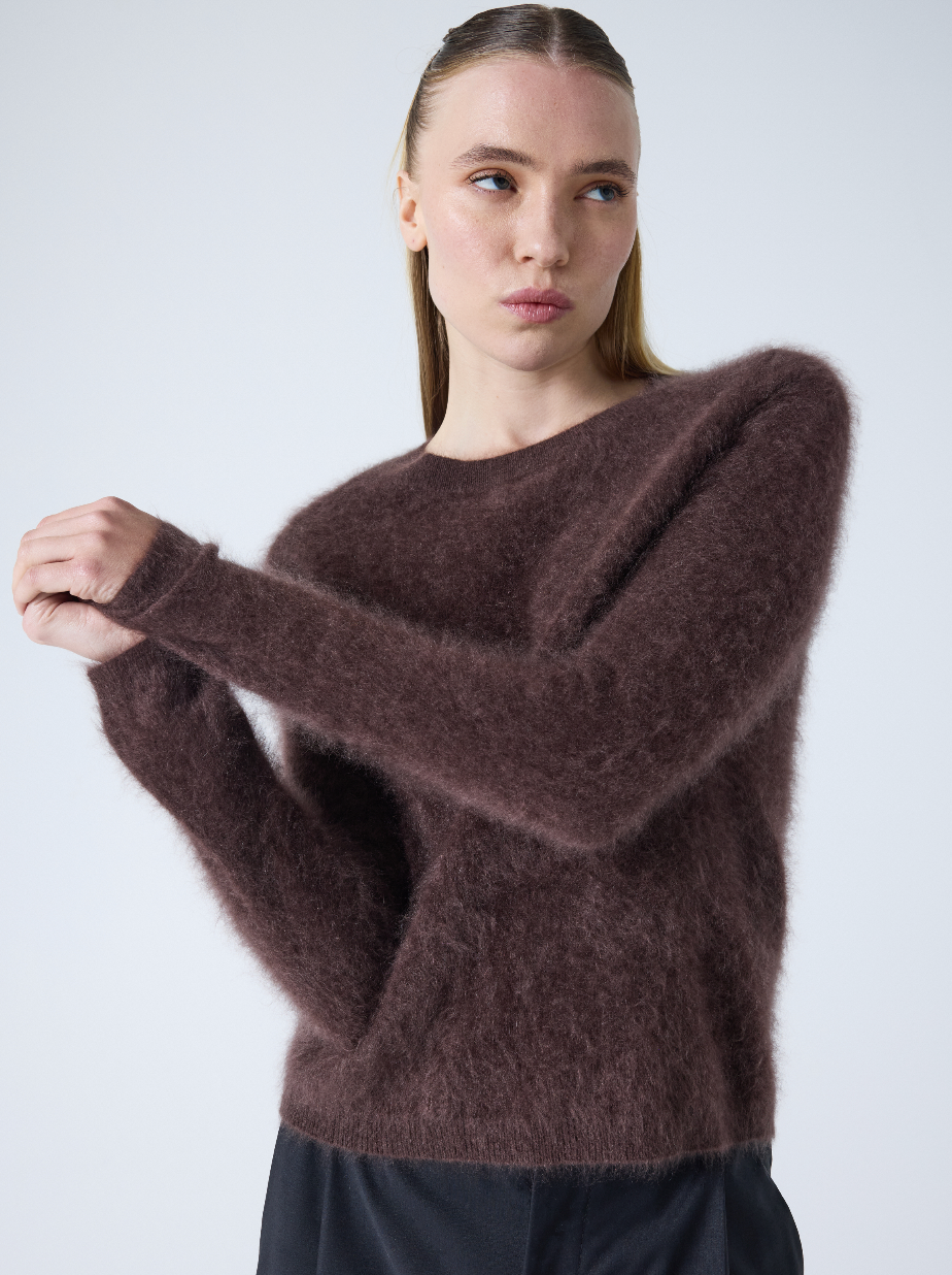 brown crew neck jumper with long sleeves and fluffy texture model shot