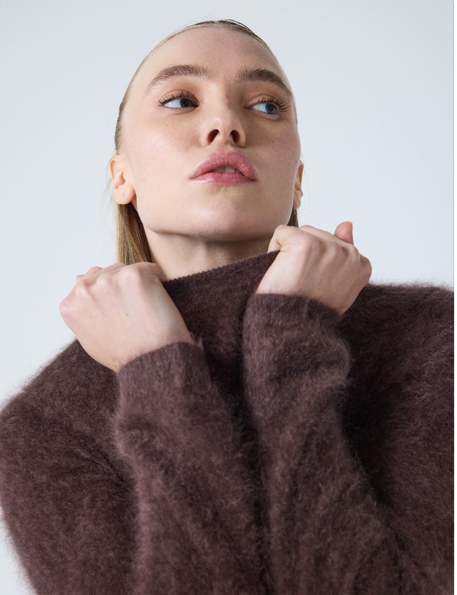 brown crew neck jumper with long sleeves and fluffy texture model shot