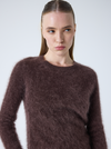 brown crew neck jumper with long sleeves and fluffy texture close up