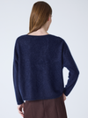 navy v neck jumper with long sleeves and fluffy texture rear view