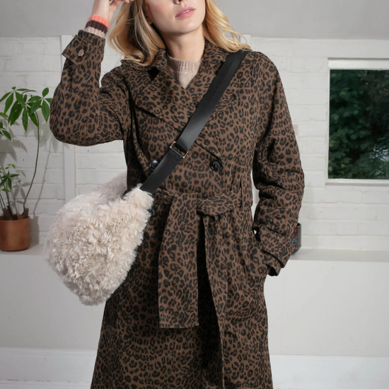 chocolate animal print tench style coat with tie belt and black buttons model shot