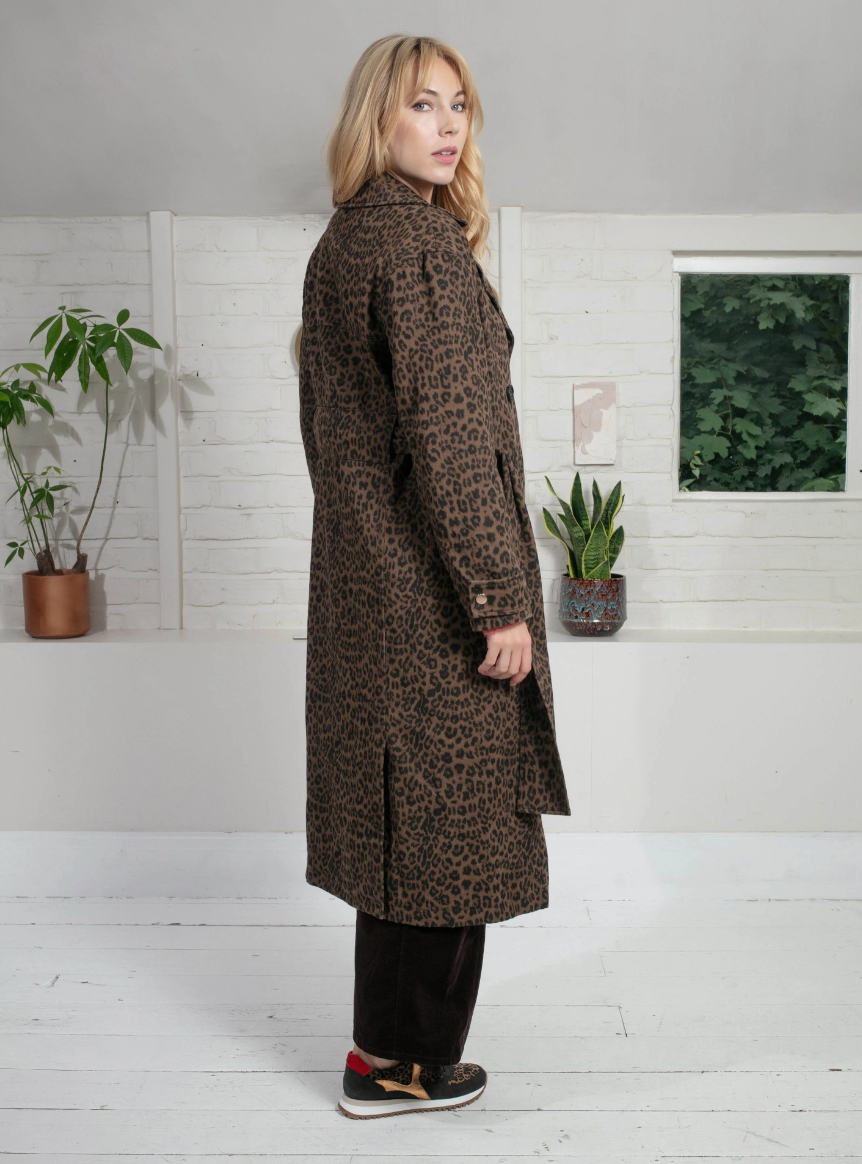 chocolate animal print tench style coat with tie belt and black buttons side view