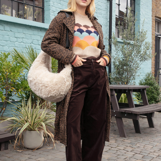 chocolate animal print tench style coat with tie belt and black buttons model shot