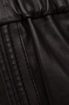 elasticated waist leather straight leg trousers from ba&sh close up of fabric