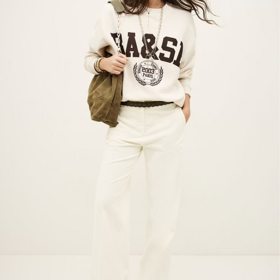 ecru sweatshirt with chocolate brown wording on the front from ba&sh model shot