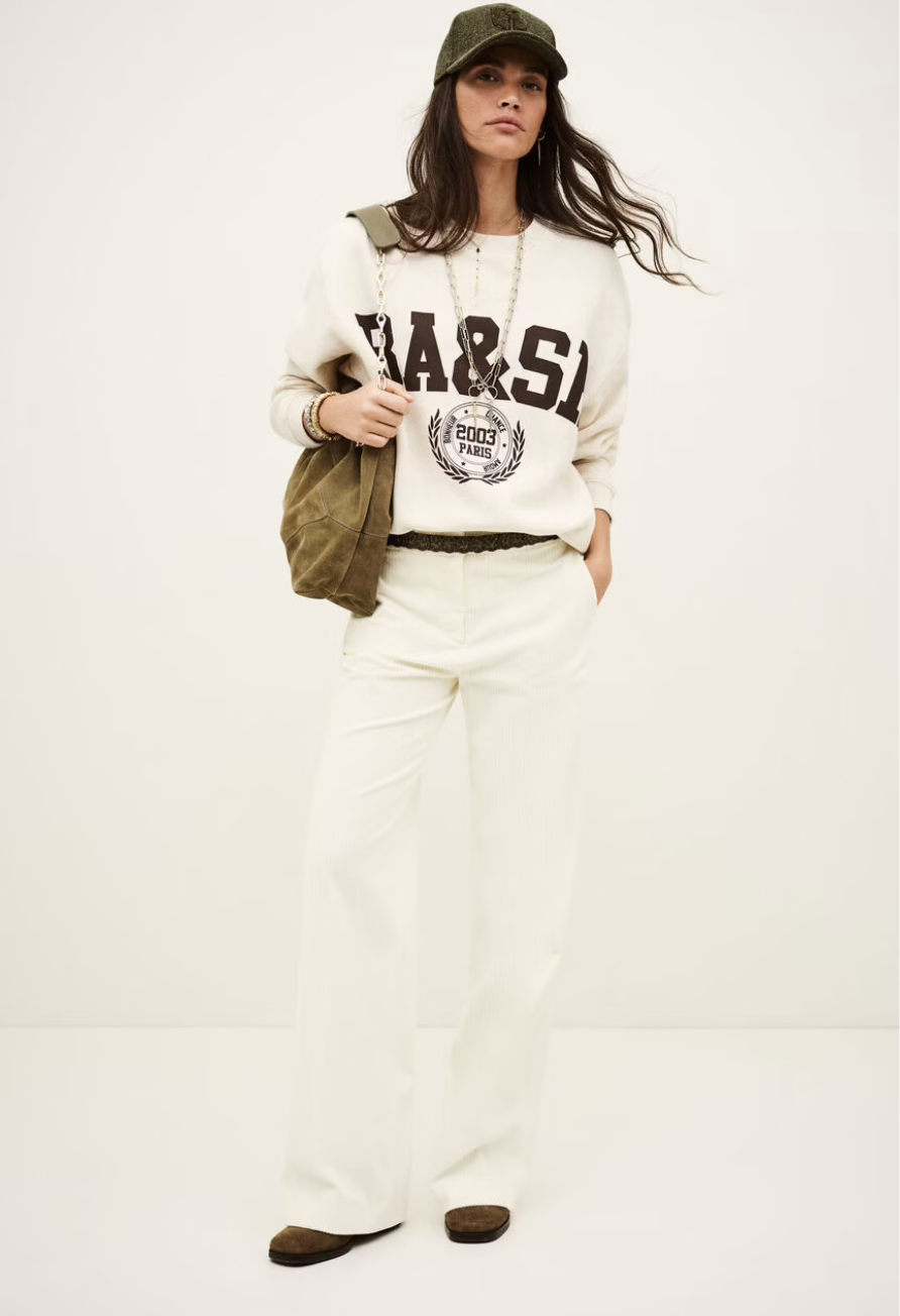 ecru sweatshirt with chocolate brown wording on the front from ba&sh model shot