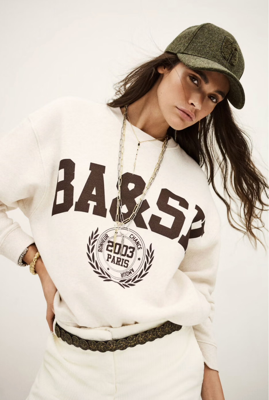 ecru sweatshirt with chocolate brown wording on the front from ba&sh model shot