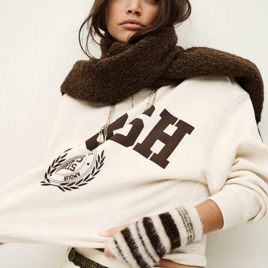 ecru sweatshirt with chocolate brown wording on the front from ba&sh model shot