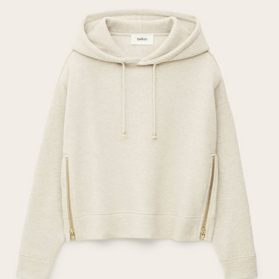 beige hoodie with gold zip sides and drawstring neck from ba&sh