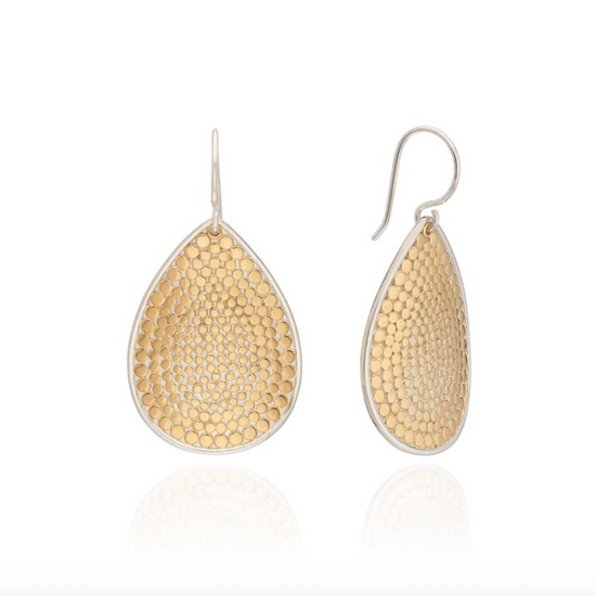 Large teardrop shaped earrings in sterling silver with gold dot work details from Anna Beck