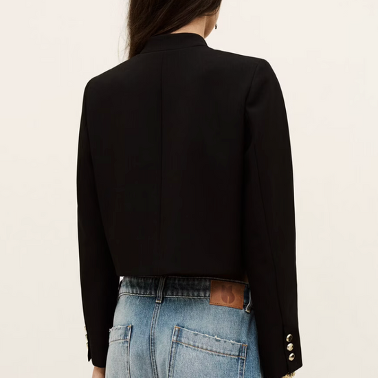 cropped black jacket with asymmetric placket and singular gold button from bash rear view