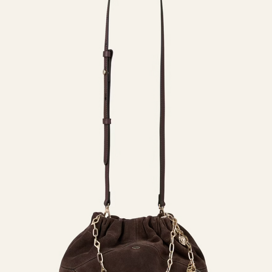 chocolate brown suede bucket style bag with gold chain strap and bag charm from ba&sh 