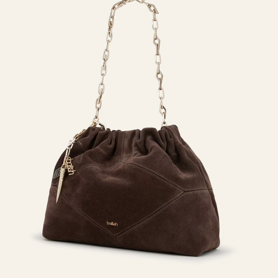 chocolate brown suede bucket style bag with gold chain strap and bag charm from ba&sh side view
