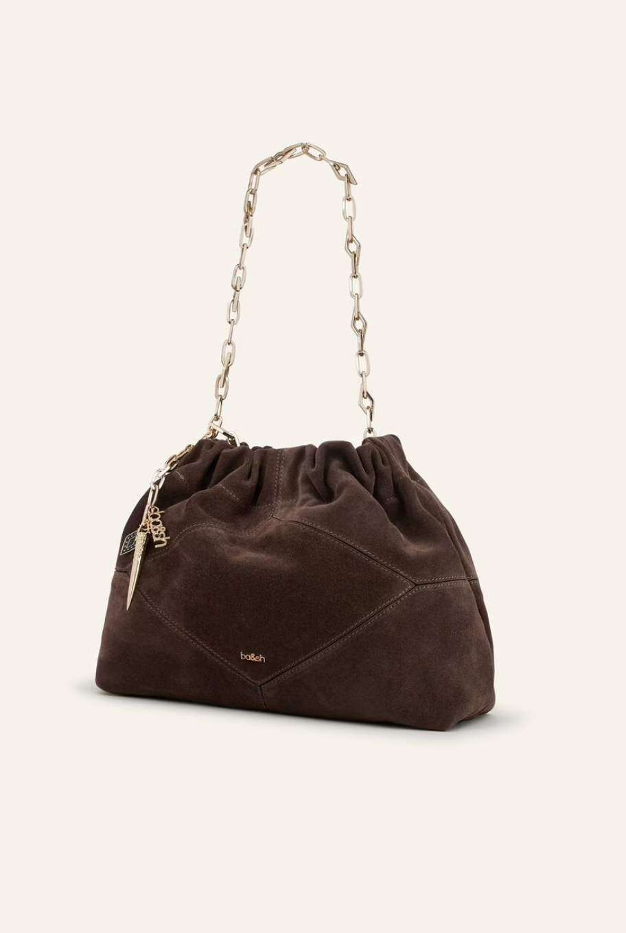 chocolate brown suede bucket style bag with gold chain strap and bag charm from ba&sh side view