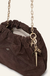 chocolate brown suede bucket style bag with gold chain strap and bag charm from ba&sh close up