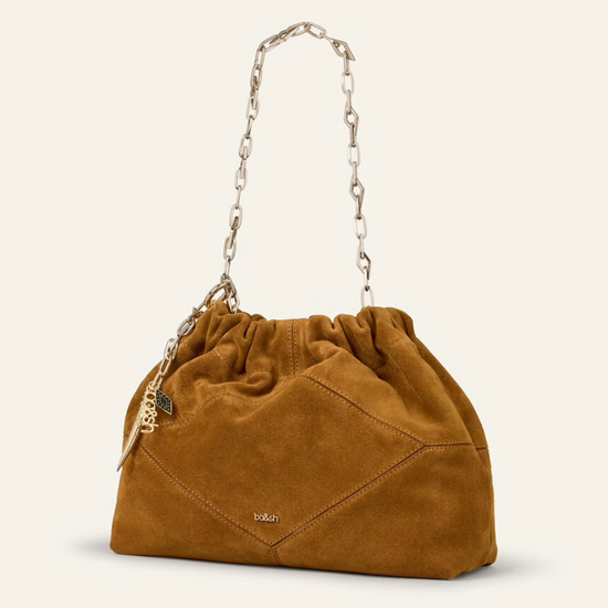 deep tan suede small bucket style bag with bag charm from ba&sh side view